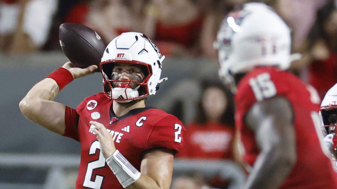 N.C. State quarterback Grayson McCall passes to tight end Justin Joly during the first half of N.C. State’s game against Western Carolina at Carter-Finley Stadium in Raleigh, N.C., Thursday, August 29, 2024.