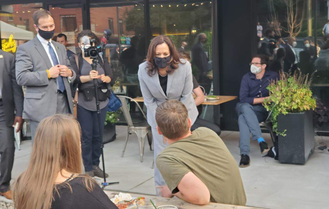 Democratic vice presidential candidate Sen. Kamala Harris talks to diners at Trophy Brewing in downtown Raleigh on Monday, Sept. 28, 2020.