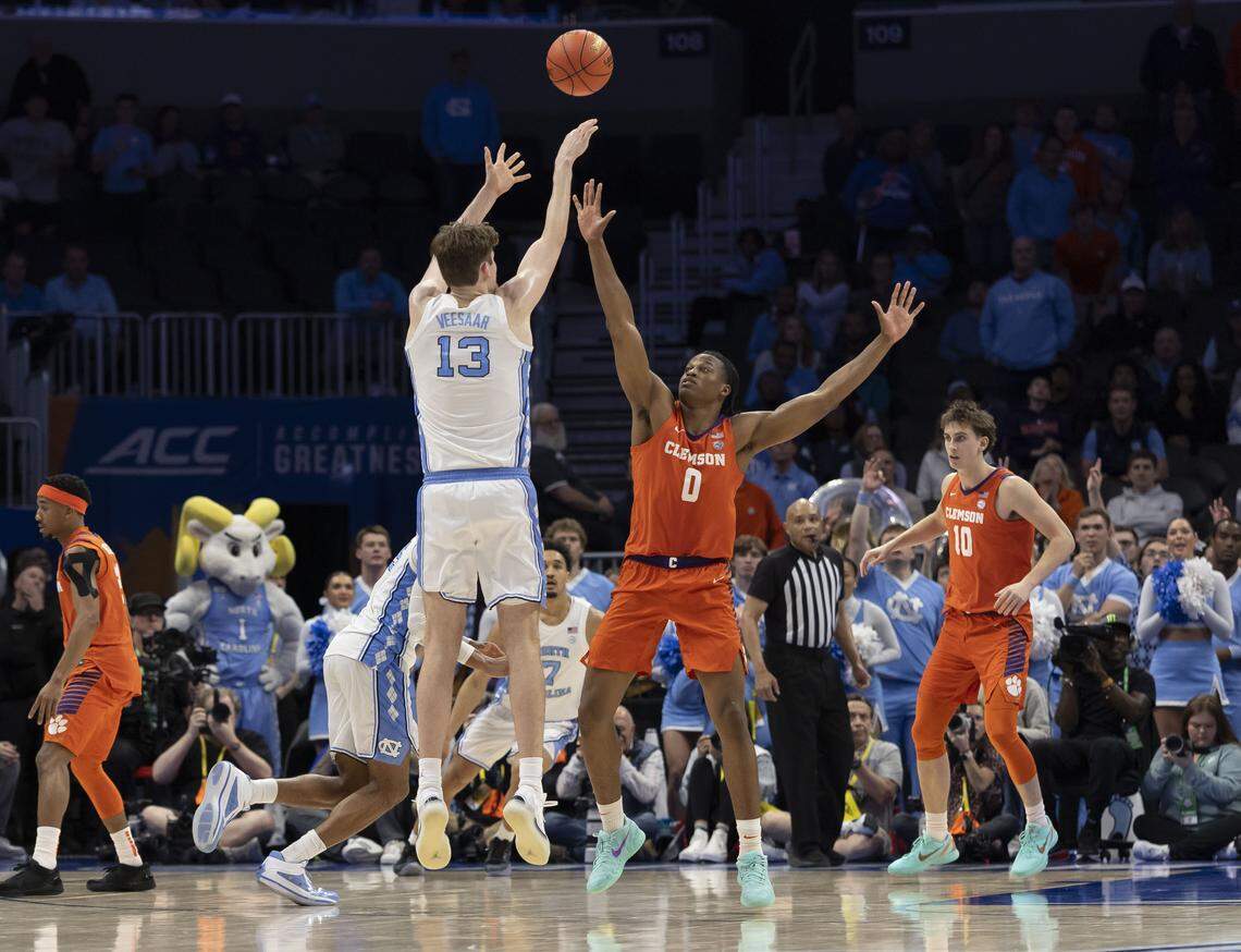 North Carolina center Henri Veesaar (13) puts up a three-point shot to cut the Clemson lead to 78-76 with 12.2 seconds to play on Thursday, March 12, 2026, during the quarterfinals of the ACC Tournament at Spectrum Center in Charlotte, N.C.