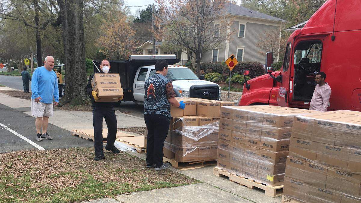 The N&O’s Adam Wagner, a Report for America journalist, photographed a donated food delivery for N.C. residents affected by coronavirus.