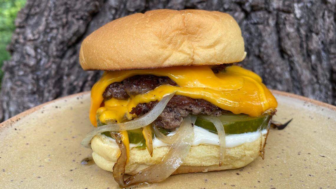 The owners of the downtown Durham cocktail bar Kingfisher will make their pandemic pop-up QueenBurger a permanent piece of the city’s burger scene.