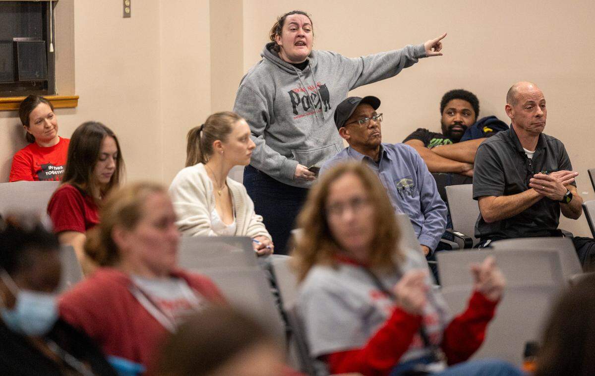 Krystal Headen Moore, a Durham special education teacher, voices her frustration during a board meeting Friday at the Staff Development Center in Durham. DPS struggled to resolve salary issues that plunged the district into chaos. The issues stem from an accounting error that resulted in administration withdrawing raises promised to 1,300 school staff, prompting protests and strikes since mid-January.