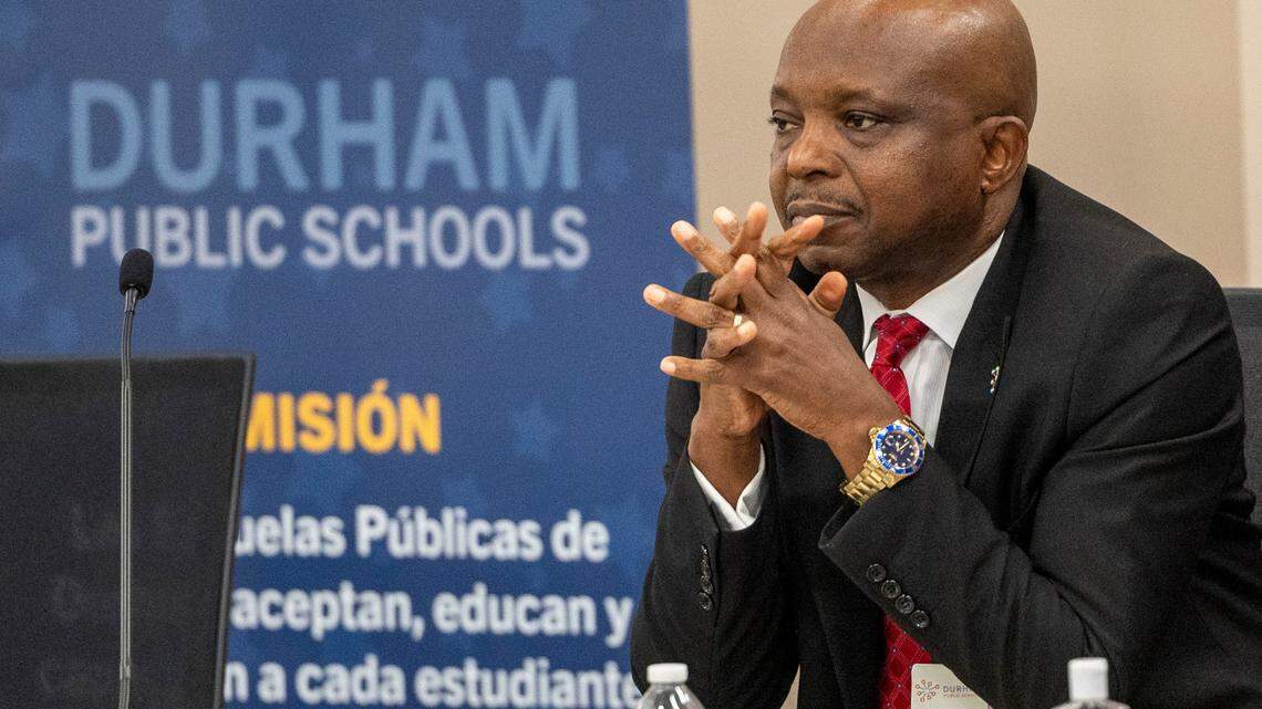 Durham Public Schools Superintendent Pascal Mubenga listens to public comments Feb. 2, 2024, during a DPS board meeting in Durham. On Feb. 7, 2024, Mubenga resigned after accounting errors and withdrawn raises threw the school district into chaos.