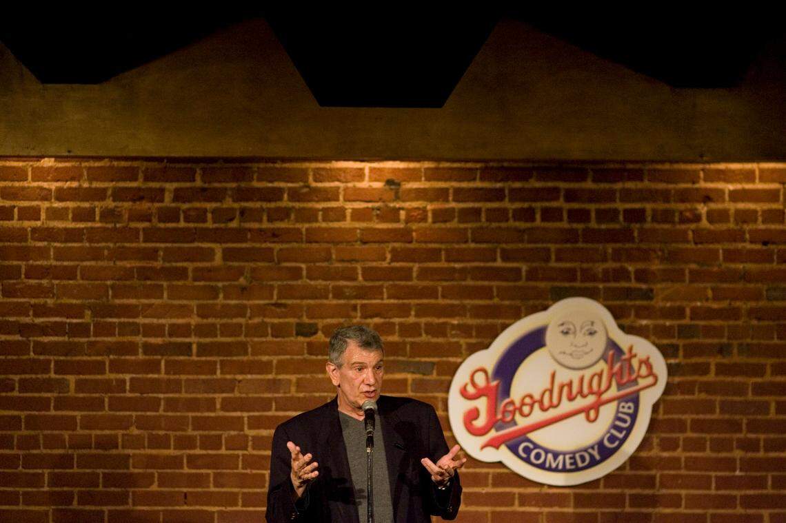 The late sitcom writer John Boni tells jokes as he hosts the open mic night at at Charlie Goodnight’s Comedy Club in 2008. Jerry Seinfeld. Robin Williams. Chris Rock. Ellen DeGeneres. All of them stood on the Goodnights stage, backs against a brick wall, so close to the crowd they could reach down and take a sip from their beers.