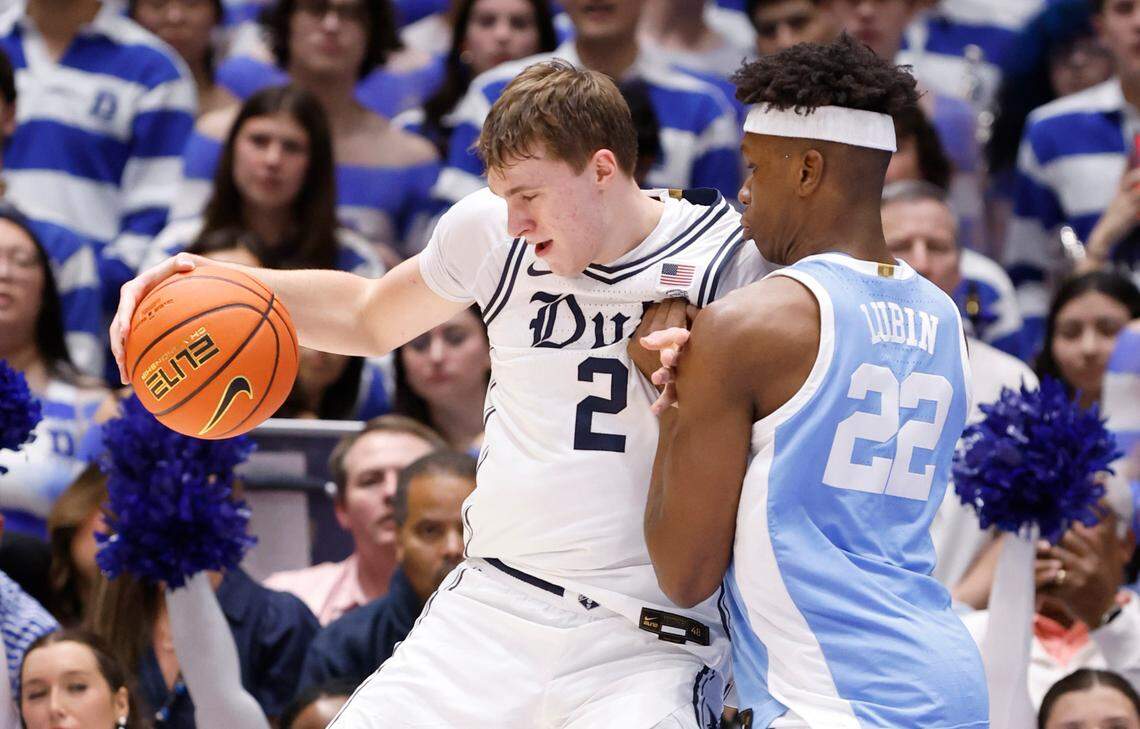 Duke’s Cooper Flagg (2) works against North Carolina’s Ven-Allen Lubin (22) during the first half of Duke’s game against UNC at Cameron Indoor Stadium in Durham, N.C., Saturday, Feb. 1, 2025.