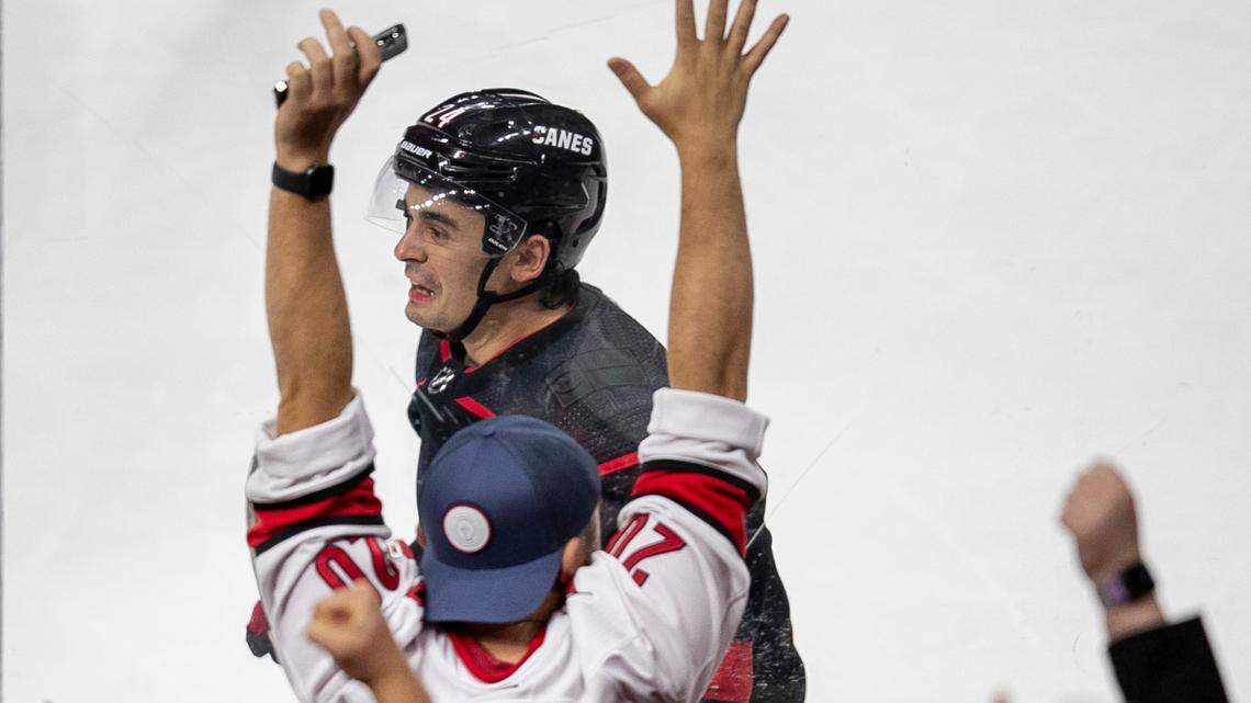 Carolina Hurricanes’ Seth Jarvis (24) reacts with fans after Martin Necas’ game winning goal to secure a 3-2 overtime victory over Ottawa on Tuesday, April 4, 2023 at PNC Arena in Raleigh, N.C.