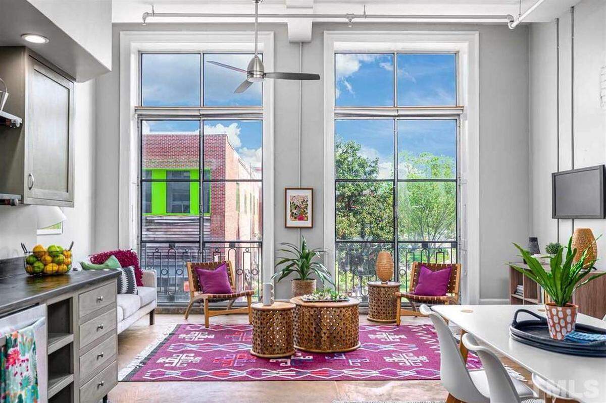 This compact 1-bed, 1-bathroom condo of 799 square feet in the Baldwin Lofts is across from the One City Center tower in the heart of downtown Durham at 109 W. Main Street, Apt. 205.