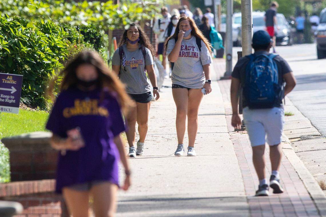 Students walk through East Carolina University Tuesday, August 18, 2020.
