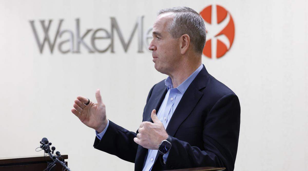 Steve Smoot, president for Advocate Health's operations in North Carolina and Georgia, speaks during a media briefing at WakeMed in Raleigh, N.C., May 5, 2026, about the proposed merger of WakeMed Health and Atrium Health. 