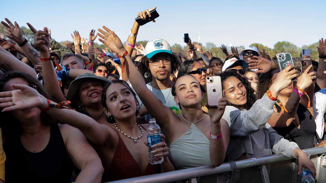Fans sway to the beat during Jessie Revez’s set at the Dreamville Festival in Raleigh, N.C., Saturday, April 1, 2023.