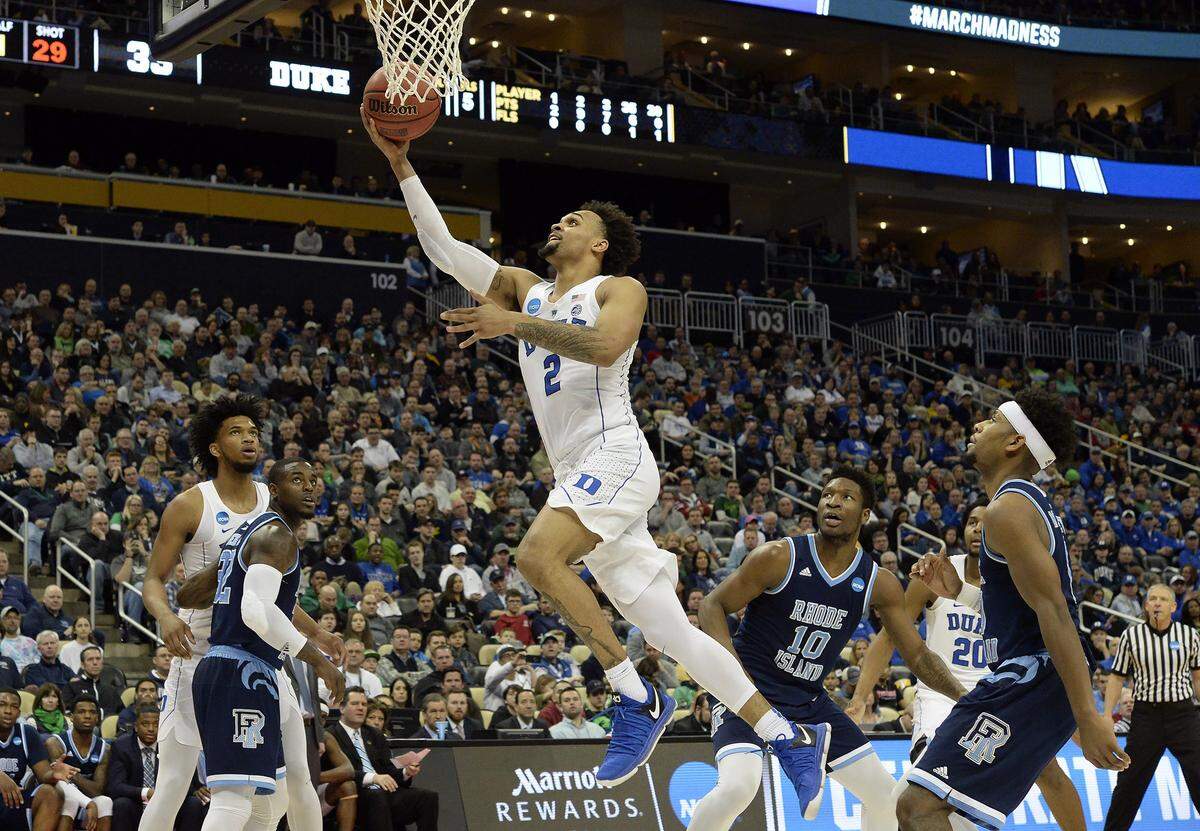 Duke guard Gary Trent Jr. (2) goes in to score in the first half against Rhode Island.