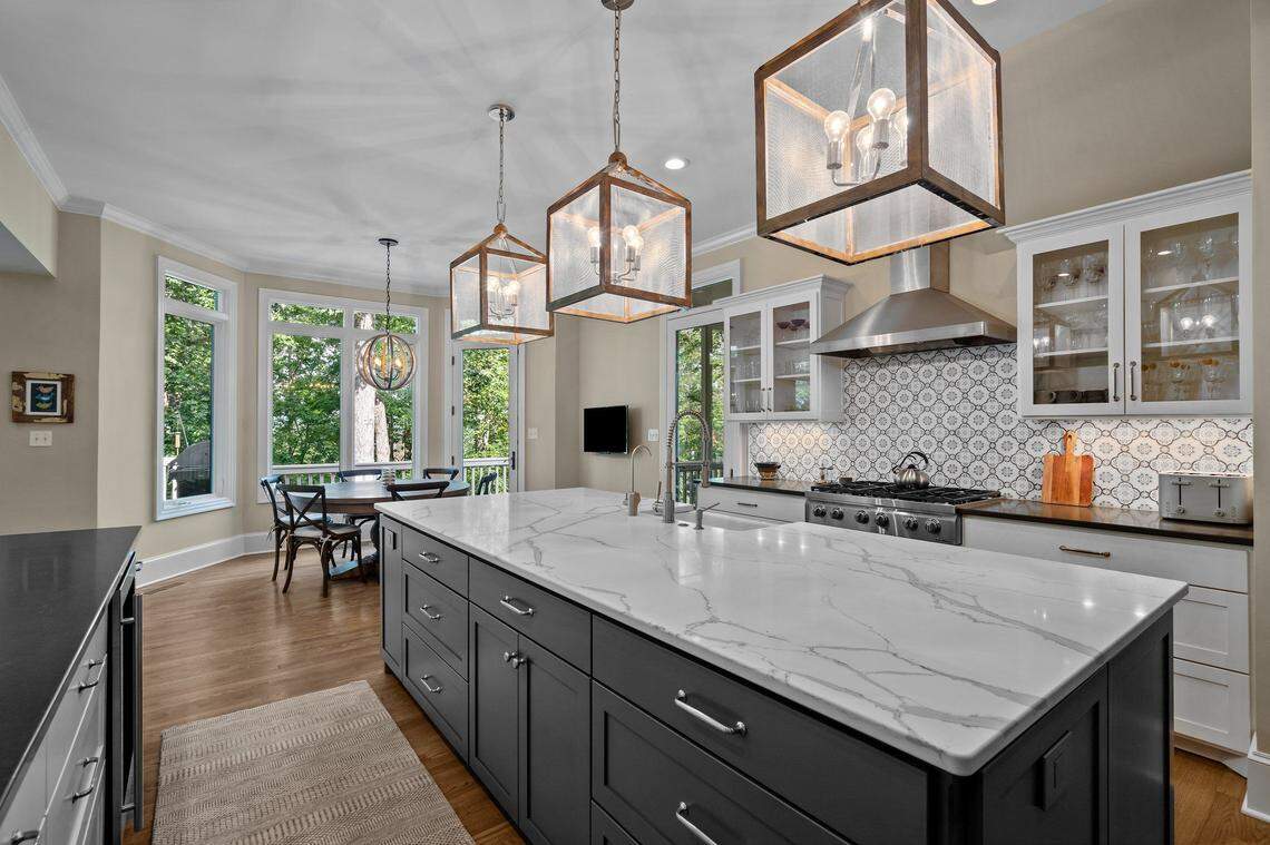 The kitchen at 32430 Archdale in the Highland Pond neighborhood of Governors Club in Chapel Hill. Custom-built by the late NBA veteran and UNC legend Eric Montross, it’s now up for sale.