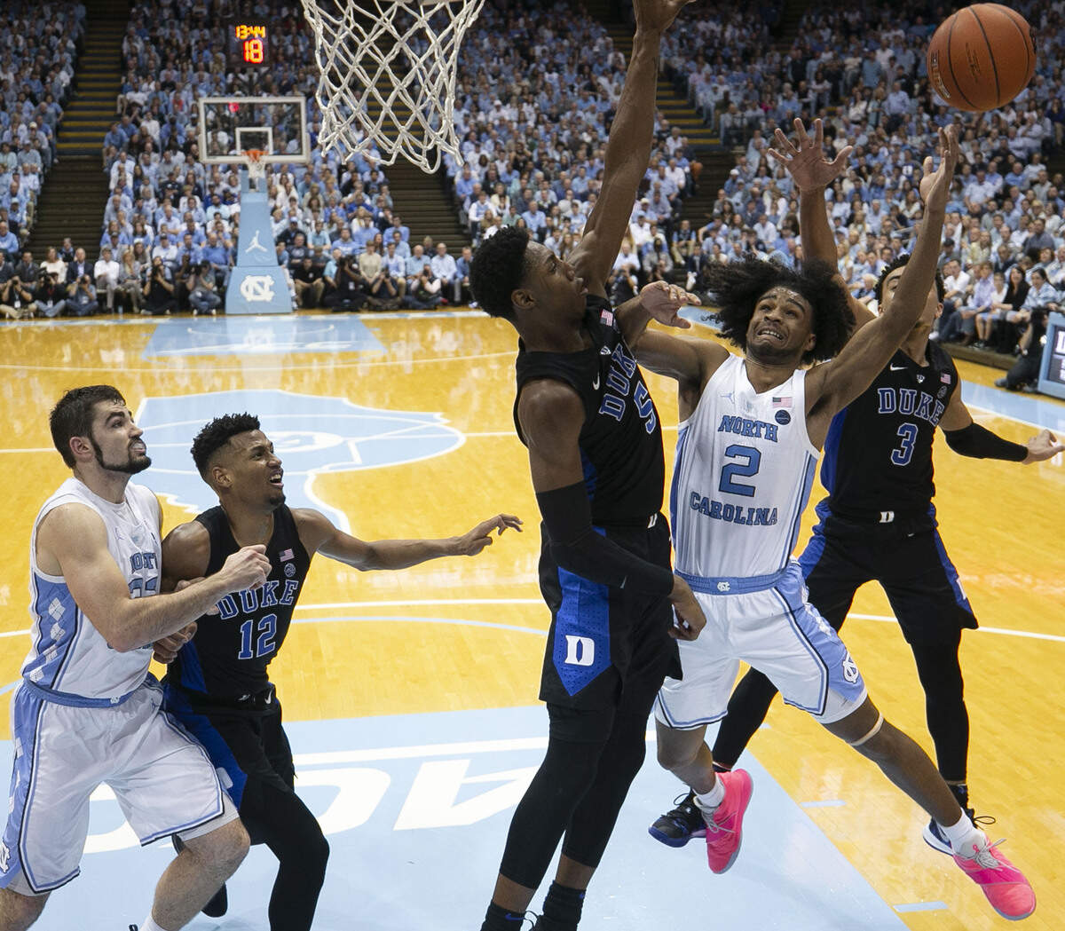 North Carolina’s Coby White (2) drives to the basket against Duke’s RJ Barrett (5) in the second half on Saturday, March 9, 2019 at the Smith Center in Chapel Hill, N.C.
