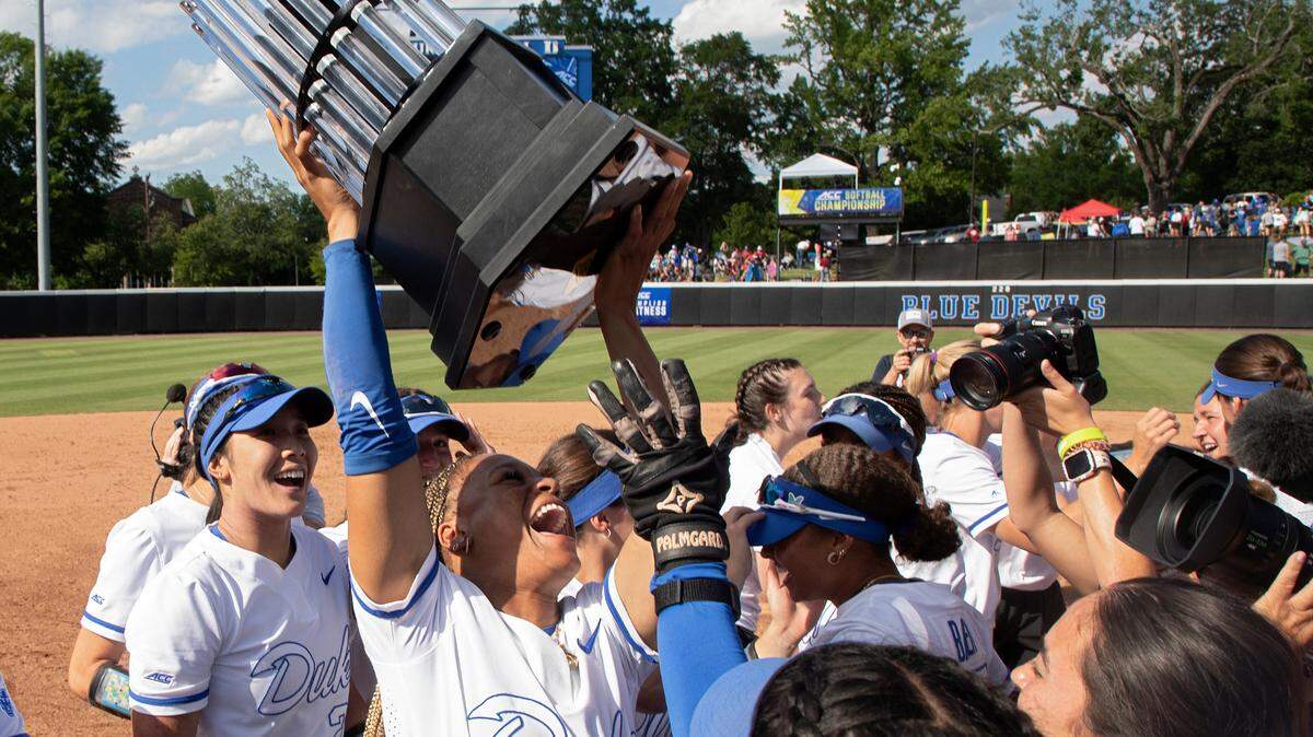 Duke’s Jala Wright hoists the ACC Tournament trophy following the Blue Devils’ 6-3 win over Florida State on Saturday, May 11, 2024, in Durham, N.C.