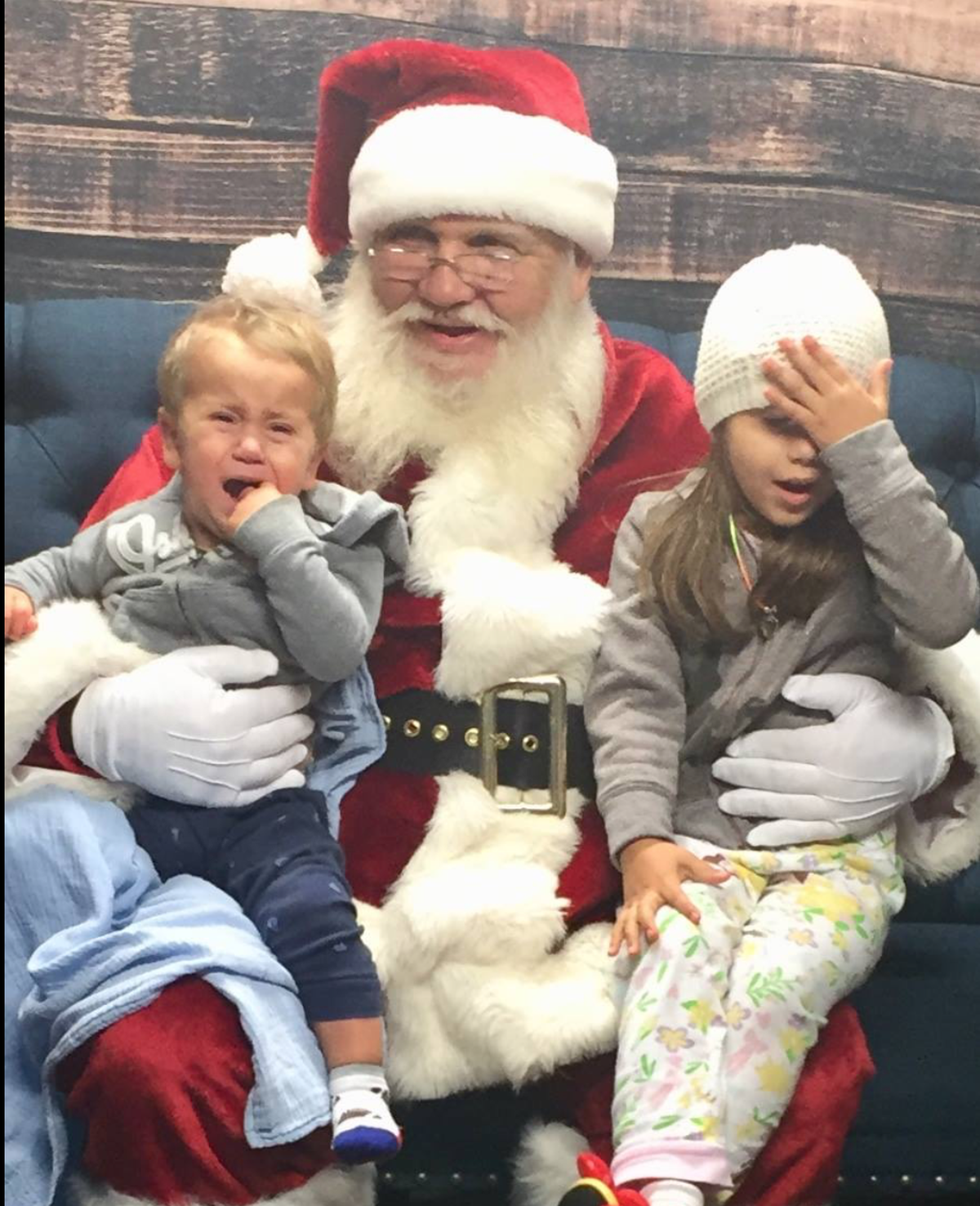 Brittney Holaday’s kids with Santa.