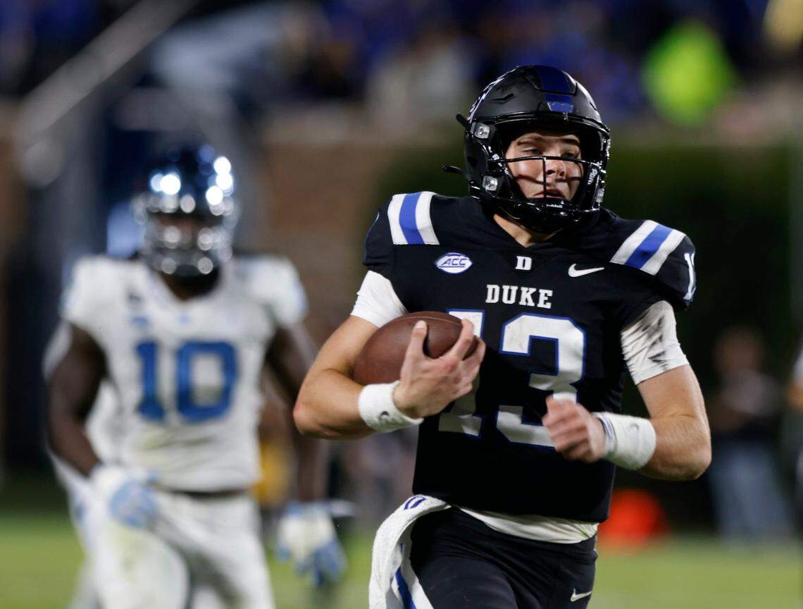 Duke Blue Devils quarterback Riley Leonard (13) runs the ball 74 yards for a touchdown during the first half of the Blue Devils’ game against North Carolina on Saturday, Oct. 15, 2022, at Wallace Wade Stadium in Durham, N.X.