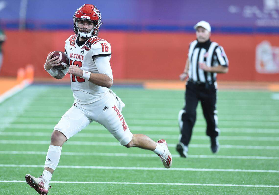 North Carolina State Wolfpack quarterback Bailey Hockman (16) runs for yards during a game against Syracuse in the second half on Saturday, Nov. 28, 2020, at the Carrier Dome in Syracuse, N.Y.