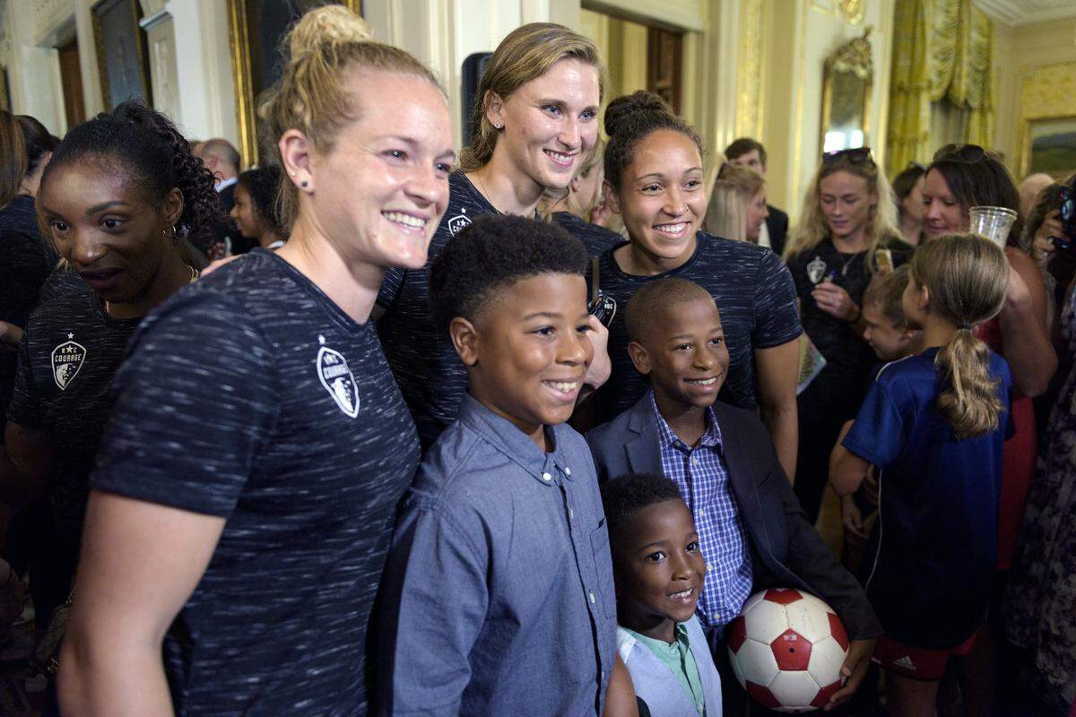 NC Courage players take photos with fans on July 19, 2019 at the North Carolina Executive Mansion in Raleigh, NC.