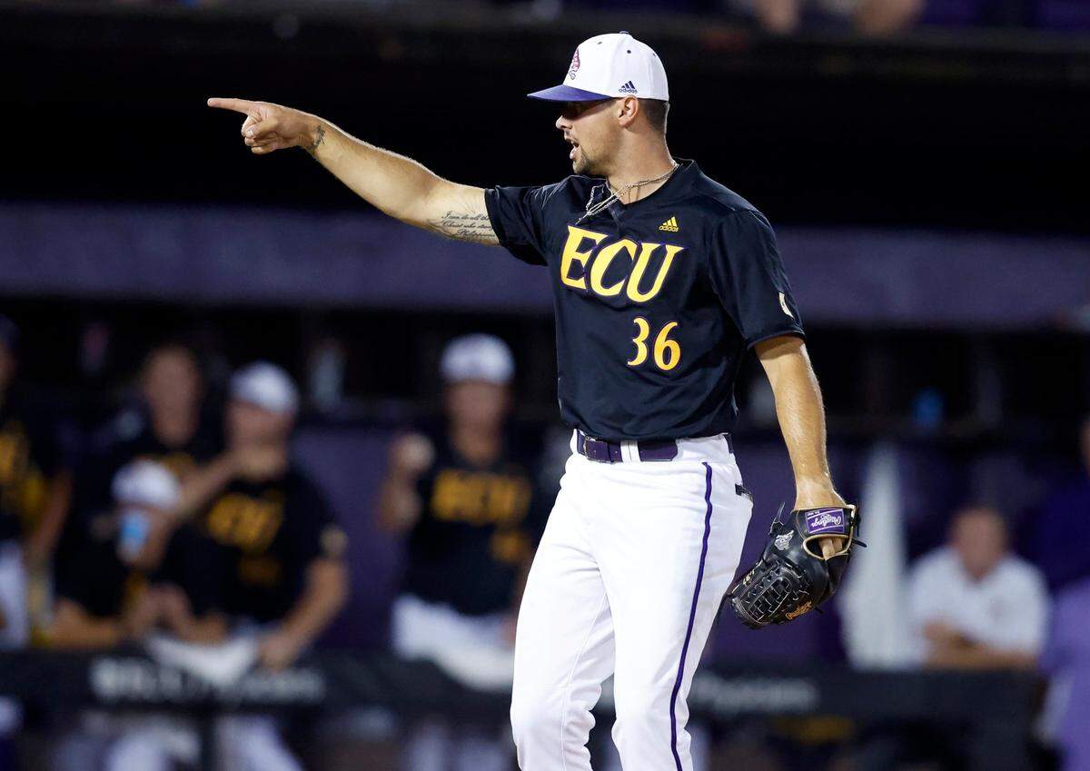 East Carolina’s Garrett Saylor (36) motions after striking out Texas Ivan Melendez to retire the side in the third inning during ECUs game against Texas in the Greenville Super Regional at Clark-LeClair Stadium Sunday, June 12, 2022.