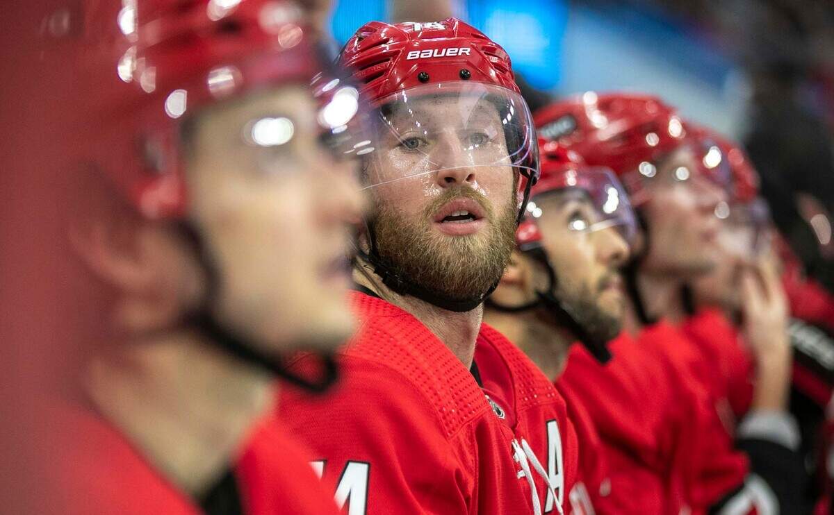 Carolina Hurricanes’ Jaccob Slavin (74) takes a seat on the bench during a time-out against the Ottawa Senators on Thursday, December 2, 2021 at PNC Arena in Raleigh, N.