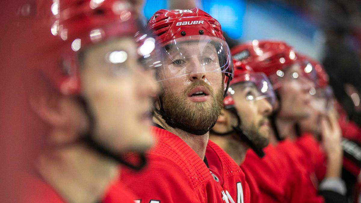 Carolina Hurricanes’ Jaccob Slavin (74) takes a seat on the bench during a time-out against the Ottawa Senators on Thursday, December 2, 2021 at PNC Arena in Raleigh, N.