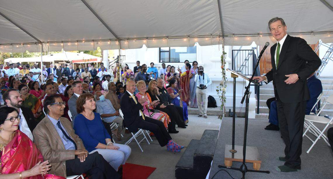 Gov. Roy Cooper addresses members of the local Hindu community during the commemoration of the Tower of Unity and Prosperity at Sri Venkateswara Temple in Cary, N.C. on Monday, Oct. 24, 2022.