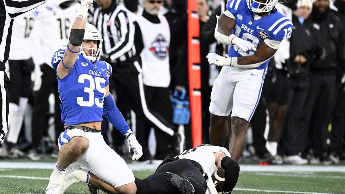 Duke linebacker Cam Dillon (35) celebrates after sacking UCF quarterback John Rhys Plumlee in the fourth quarter during the Military Bowl Presented by Peraton at Navy-Marine Corps Memorial Stadium on Wednesday, Dec. 28, 2022, in Annapolis, Maryland. (Greg Fiume/Getty Images/TNS)