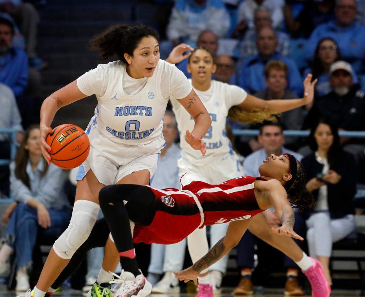 North Carolina’s Alexandra Zelaya is fouled by N.C. State’s Aziaha James during the second half of the Tar Heels’ 80-70 win on Thursday, Feb. 22, 2024, at Carmichael Arena in Chapel Hill, N.C.