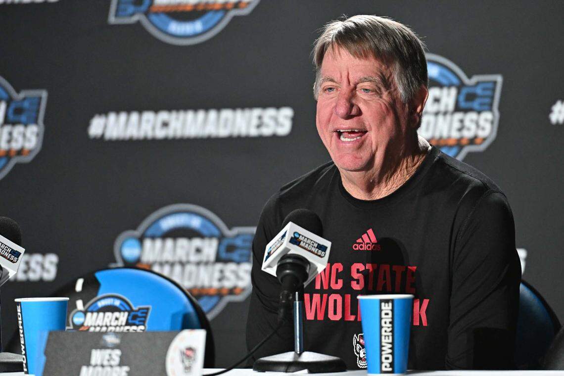 NC State Wolfpack head coach Wes Moore talks with media during an NCAA Tournament practice session at Spokane Arena.