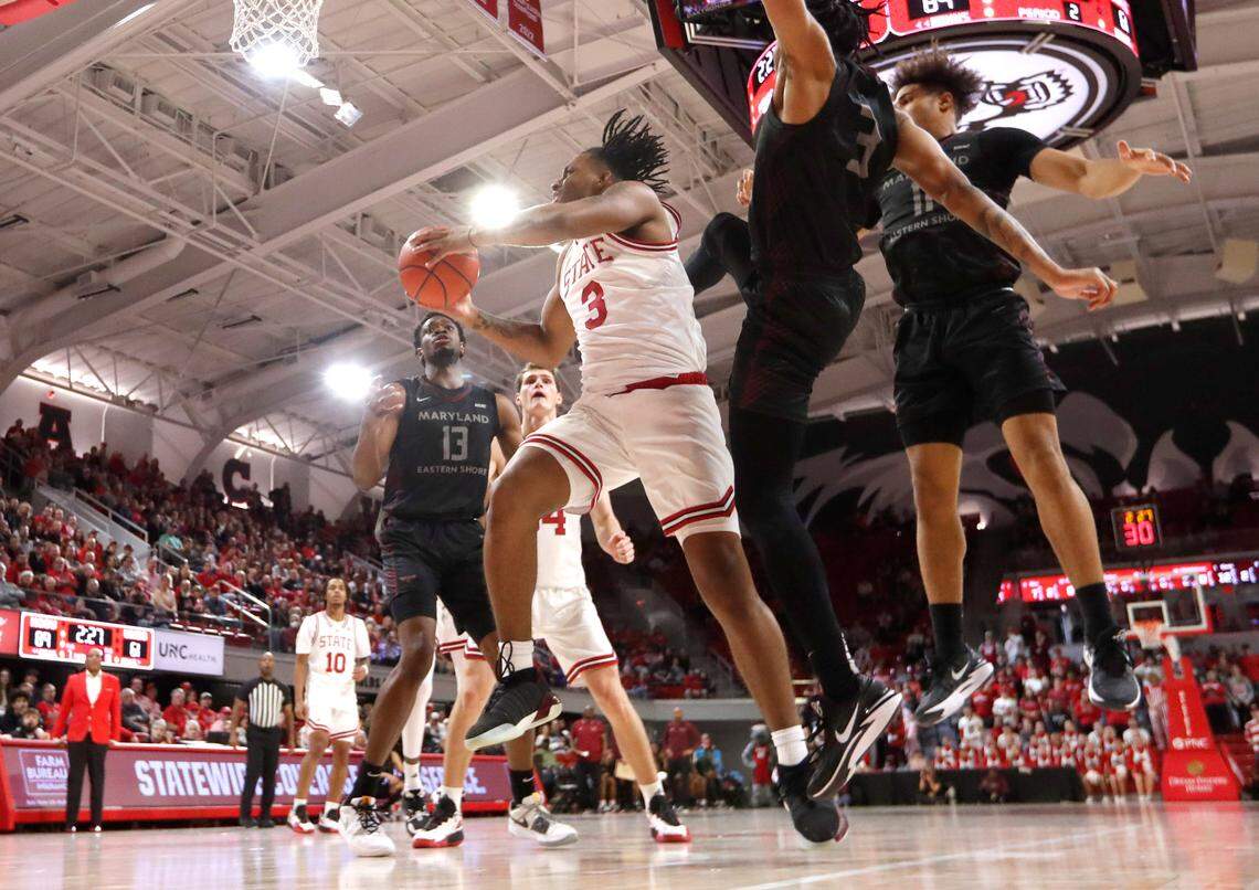 N.C. State’s MJ Rice (3) pulls in the rebound during N.C. State’s 93-61 victory over Maryland Eastern Shore at Reynolds Coliseum in Raleigh, N.C., Wednesday, Dec. 6, 2023.
