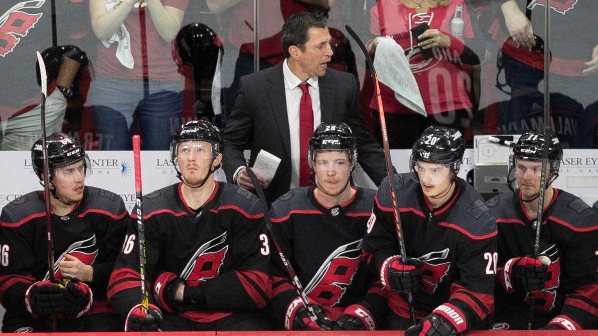 Carolina Hurricanes coach Rod Brind’Amour talks with his players during the second period against the New York Islanders in Game 4 of their Stanley Cup series on Friday, May 3, 2019 at PNC Arena in Raleigh, N.C.