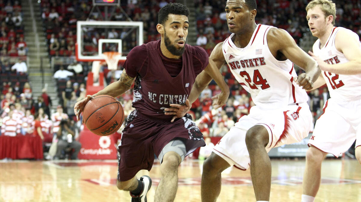 Former North Carolina Central point guard Emanuel “Poobie” Chapman, seen here during a win over N.C. State in 2013, was named the new men’s basketball coach at Enloe High School on Monday.