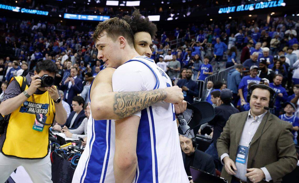 Duke’s Tyrese Proctor (5) hugs Cooper Flagg (2) after Duke’s 85-65 victory over Alabama in their Elite 8 game in the 2025 NCAA Men’s Basketball Championship at the Prudential Center in Newark, N.J., Saturday, March 29, 2025.