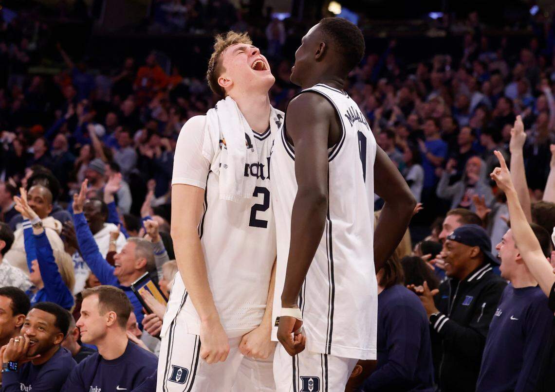 Duke’s Cooper Flagg (2) celebrates with Khaman Maluach (9) after Spencer Hubbard hit a three-pointer during the second half of Duke’s 110-67 victory over Illinois in the SentinelOne Classic at Madison Square Garden in New York City Saturday, Feb. 22, 2025.