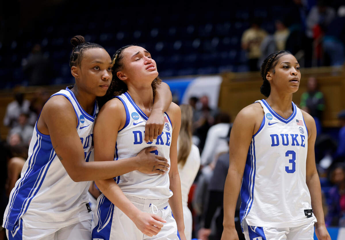 Duke’s Jordyn Oliver, Celeste Taylor and Ashlon Jackson walk off the court following the Blue Devils’ 61-53 loss to Colorado in an NCAA Tournament second round game at Cameron Indoor Stadium on Monday, March 20, 2023, in Durham, N.C.