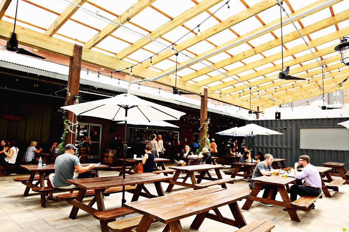 There are multiple seating areas throughout the newly opened Morgan Street Food Hall in downtown Raleigh including patio seating, Aug. 20, 2018.