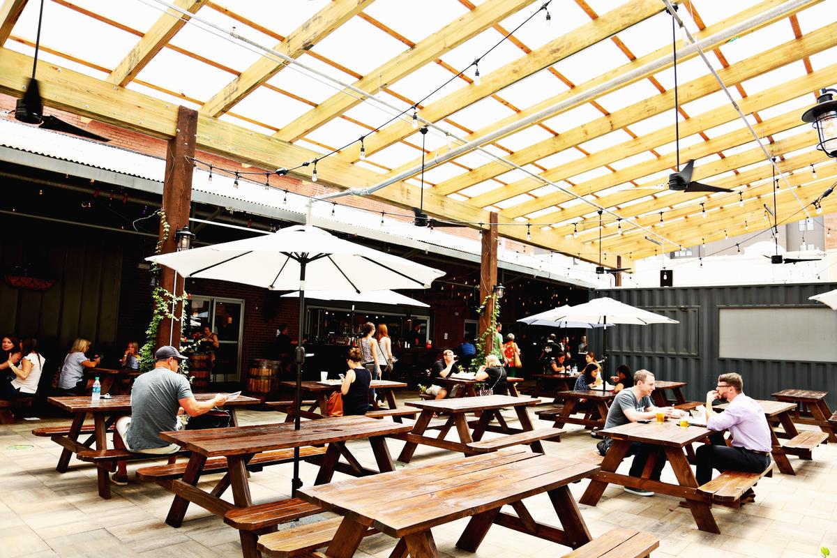 There are multiple seating areas throughout the newly opened Morgan Street Food Hall in downtown Raleigh including patio seating, Aug. 20, 2018.