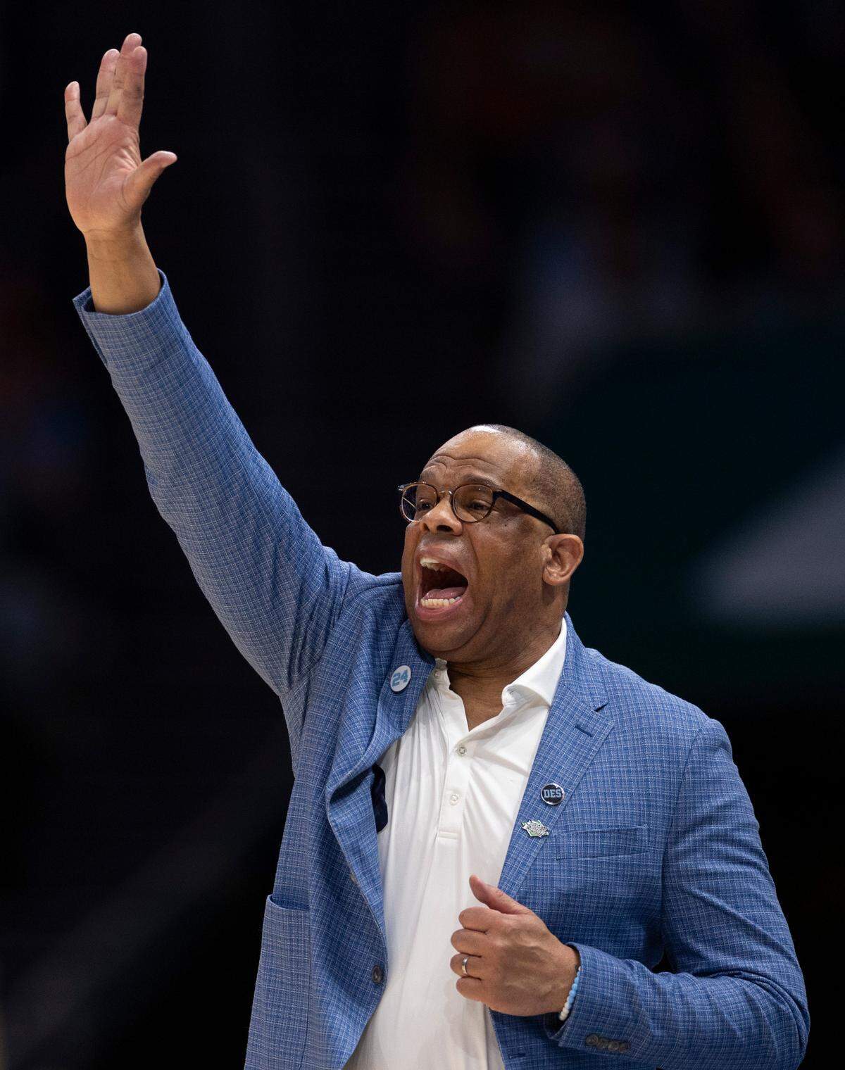 North Carolina coach Hubert Davis directs his team on defense in the second half against Wagner on Thursday, March 21, 2024 during the NCAA Tournament at Spectrum Center in Charlotte, N.C.