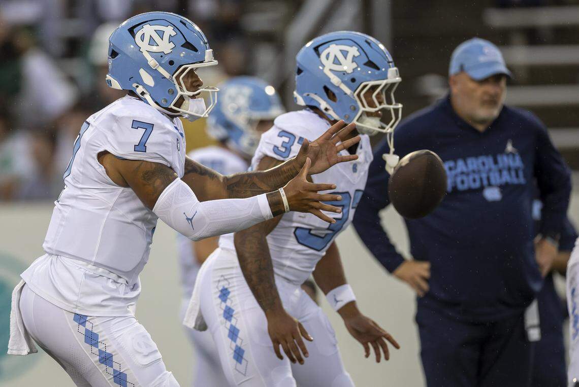 North Carolina quarterback Gio Lopez (7) warms up for the Tar Heels’ game against the University of North Carolina at Charlotte on Saturday, September 6, 2025 at Jerry Richardson Stadium in Charlotte, N.C. 