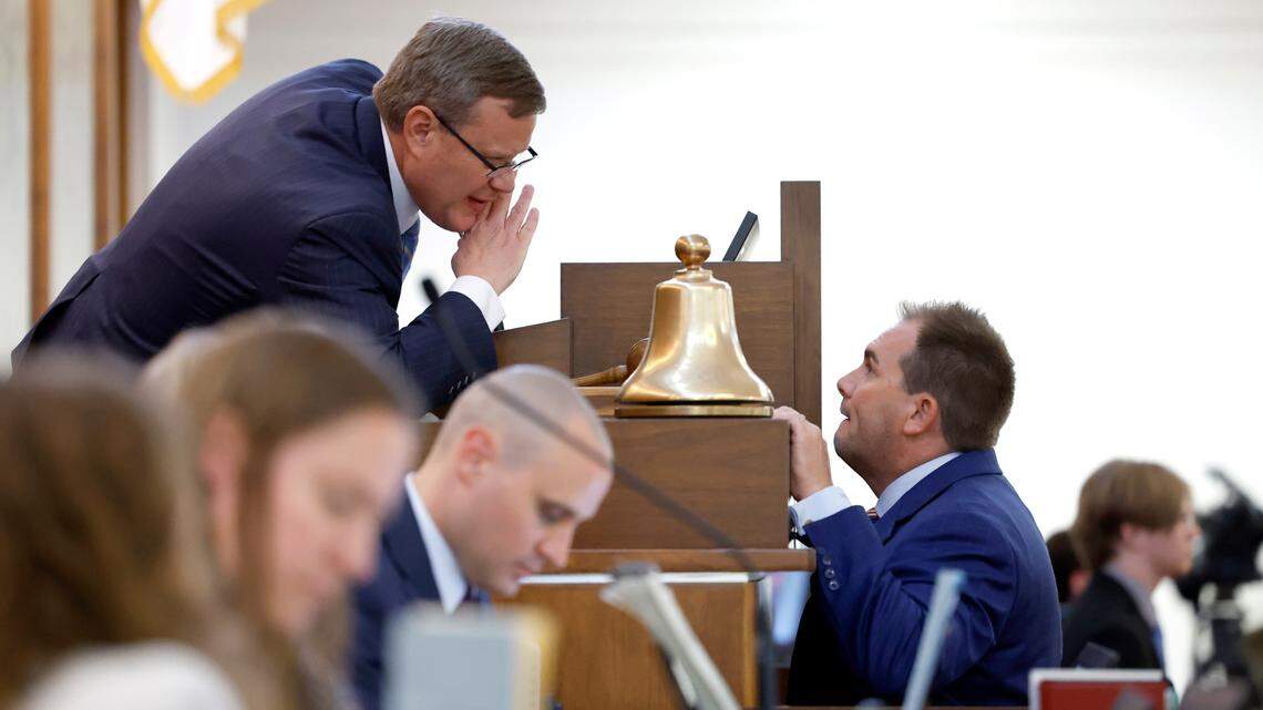 North Carolina House Speaker Tim Moore talks with Rep. John Bell during the N.C. House session in Raleigh, N.C., Wednesday, June 21, 2023.