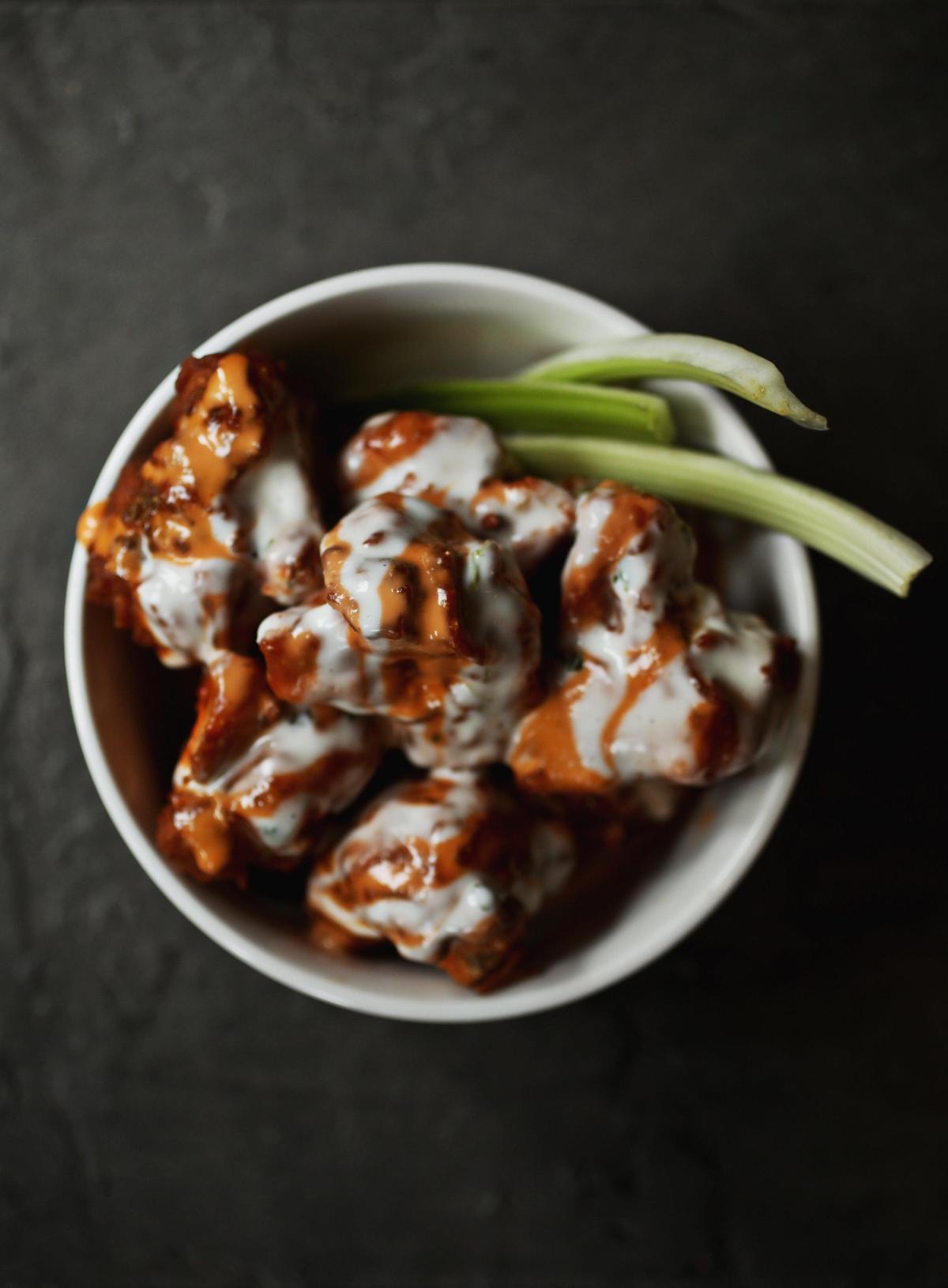 The cauliflower wings, battered and deep-fried, will satisfy a craving for Buffalo wings at Earth to Us in Durham.