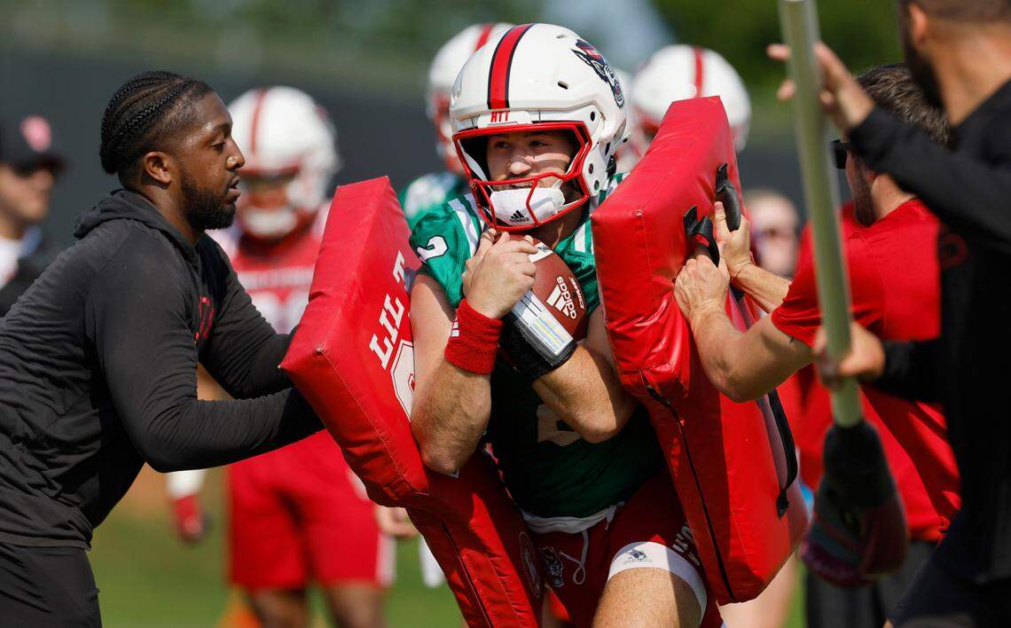 N.C. State quarterback Grayson McCall (2) runs drills during the Wolfpack’s first practice in Raleigh, N.C., Wednesday, July 31, 2024.