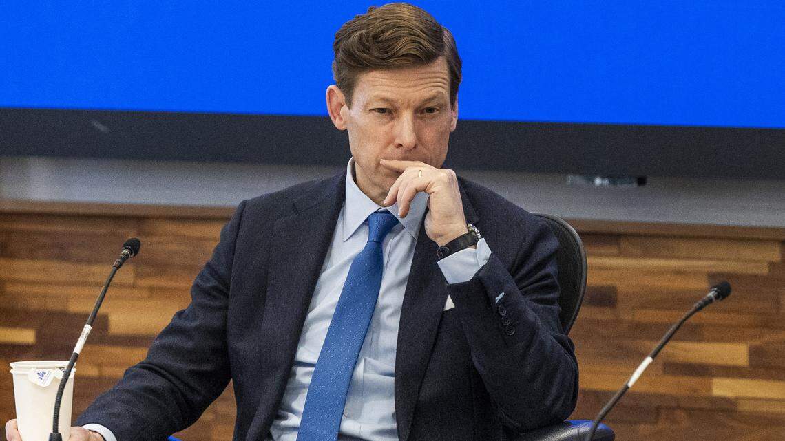 UNC-Chapel Hill Chancellor Lee Roberts, left, and UNC-Chapel Hill Board of Trustees Chair Malcolm Turner preside over the board’s open session meeting at the Spangler Center for Public Health in Chapel Hill on Thursday, Jan. 22, 2026. The board backed a surprise resolution Wednesday to cut $17 million in administrative costs, a proposal that relies in part on layoffs and further cuts to academic centers and institutes.