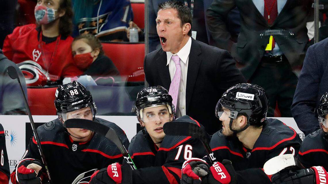 Carolina Hurricanes head coach Rob Brind”Amour protests a call with an official during the third period of an NHL hockey game against the Washington Capitals in Raleigh, N.C., Sunday, Nov. 28, 2021. (AP Photo/Karl B DeBlaker)