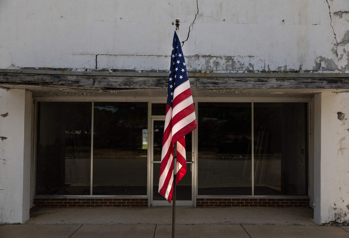 An U.S. flag stands in front of a long-closed business in downtown Stantonsburg.