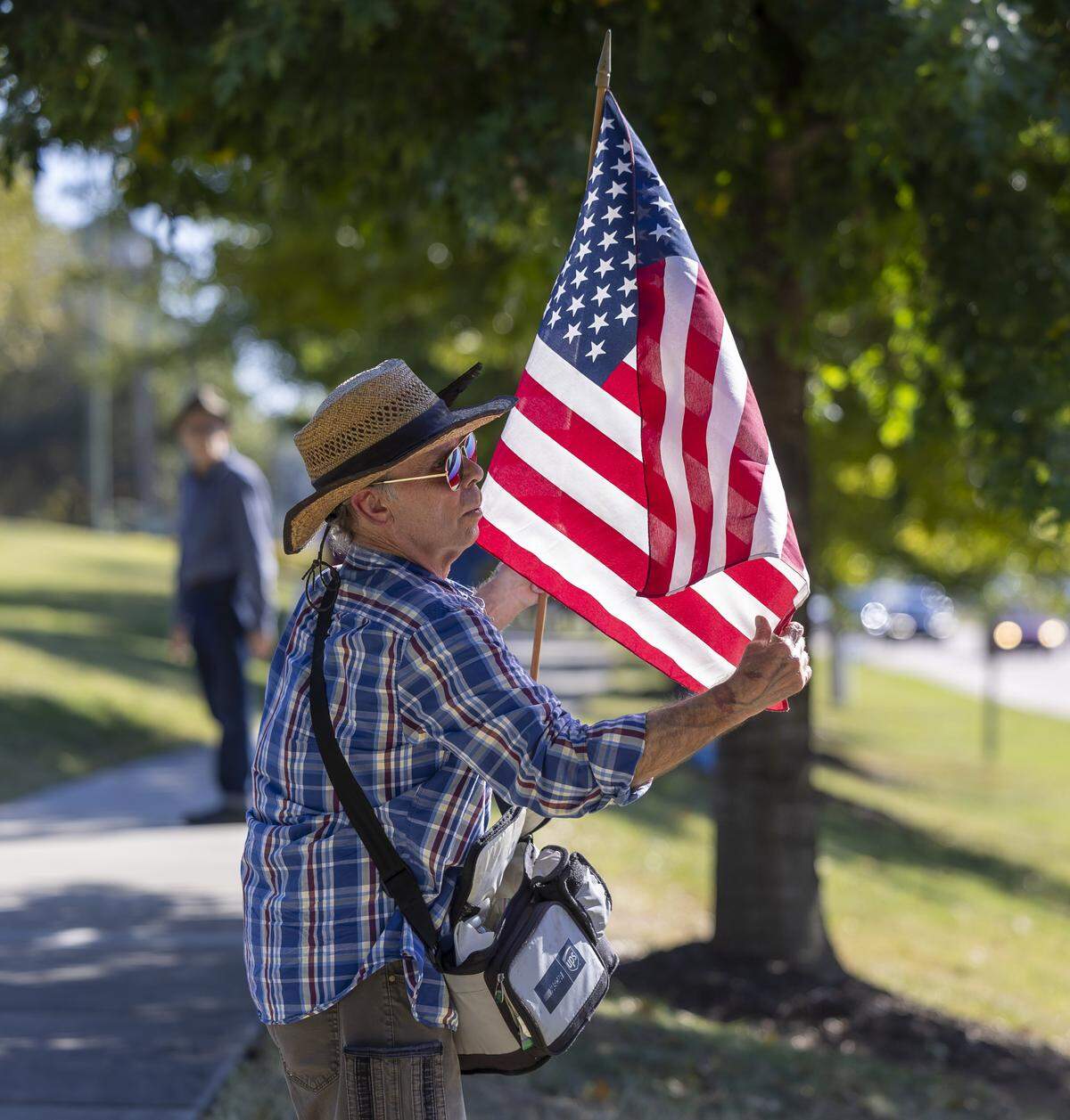 Cliff Dobbins of Raleigh, N.C. was one of the last to depart Capital Blvd, well after 3 p.m., following a three hour ‘No Kings’  demonstration that was attended by thousands on Saturday, October 18, 2025 in Raleigh, N.C. 
