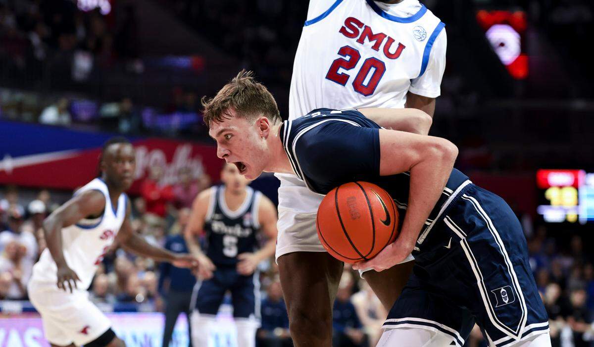 Duke Blue Devils guard Cooper Flagg (2) drives to the basket past Southern Methodist Mustangs forward Jerrell Colbert (20) during the first half at Moody Coliseum.