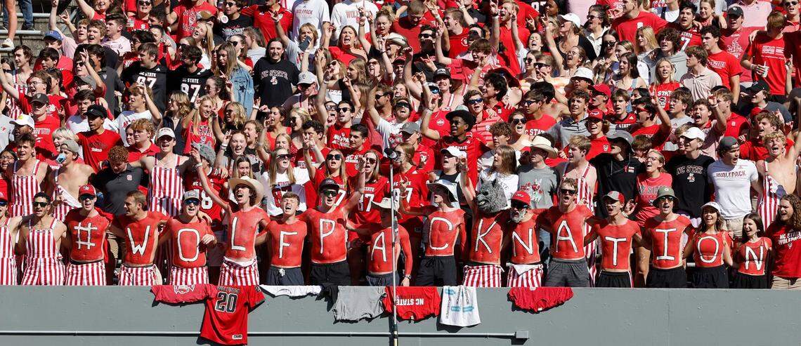 N.C. State fans sing the alma mater before the Wolfpack’s game against Clemson at Carter-Finley Stadium in Raleigh, N.C., Saturday, Oct. 28, 2023.