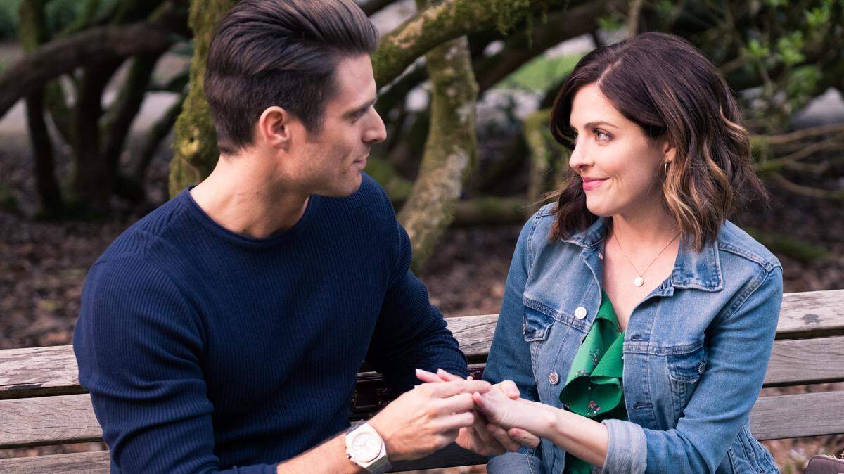 Marcus Rosner, left, and Jessica Lowndes  in the Hallmark movie "Yes, I Do."