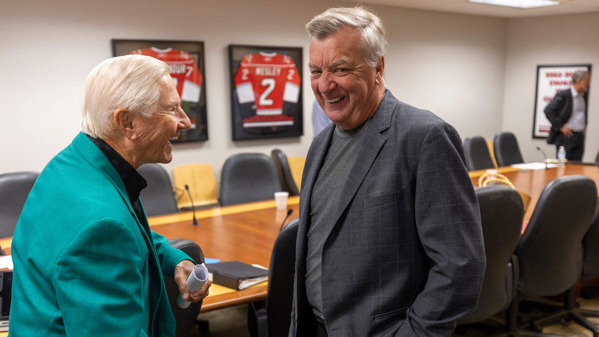 Centennial Authority board member Wendell Murphy talks with Carolina Hurricanes General Manager Don Waddell following the Centennial Authority meeting on Tuesday, August 15, 2023 at PNC Arena in Raleigh, N.C.
